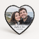 Personalised heart photo slate printed with a romantic couple selfie and the text Sophie & Tom and 14.02.2020, on a plain background