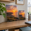 Personalised metal photo print, an 8x10in panel and a 4x6in panel leaning on a shelf in a modern UK home office