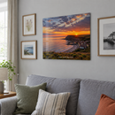 Personalised metal photo print, hanging on a light grey living room wall above a sofa as part of a small gallery wall