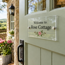 Personalised acrylic door plaque on a holiday cottage door