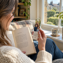 Woman reading with a personalised acrylic photo bookmark