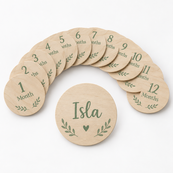 Baby milestone wooden discs set of 12 personalised with the name Isla