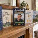 Personalised 40th birthday game case card on a mantelpiece