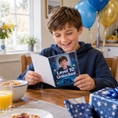 Boy opening a personalised birthday game case card with his photo