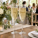 Personalised prosecco flute with the name Lucy at a wedding reception table