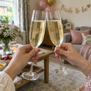Personalised prosecco flute with the name Lucy clinked at a hen party