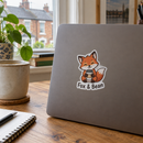 Custom die-cut stickers on a laptop