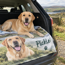 Dog on a personalised pet blanket in a car boot