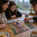 A rainy day scene with a window streaked with rain and a family's hands fitting the last piece into a personalised photo jigsaw showing their dog with the text 'Love from Rolo'