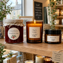 Custom product labels on candles in a boutique