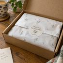 Thank you stickers sealing tissue paper in a parcel