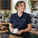 Logo polo shirt worn by café staff