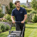 Logo polo shirt worn by a gardener