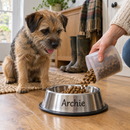 Owner filling a personalised stainless steel pet bowl