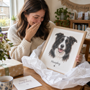 Woman receiving a custom pet portrait print as a gift