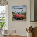 Personalised metal photo clock, a square version hanging on a kitchen wall in a UK home