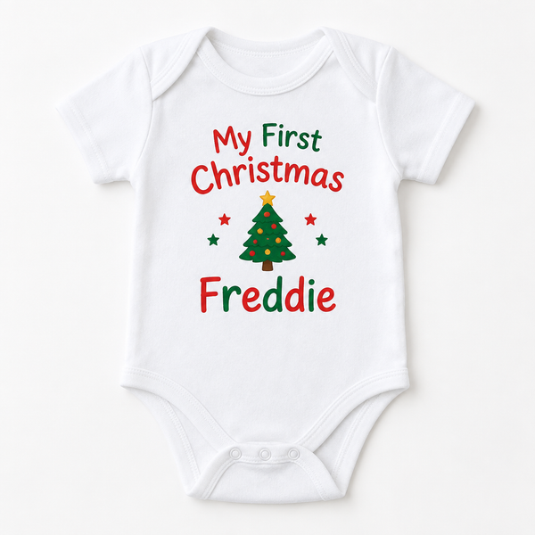My first Christmas baby grow with the name Freddie on a white background