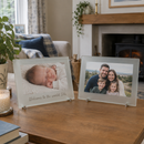 Personalised frosted glass photo frame, a landscape version on a mantelpiece showing a family group photo, cosy UK living room