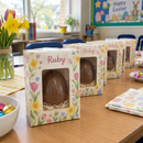 Personalised Easter egg box with the name Ruby lined up at an Easter party