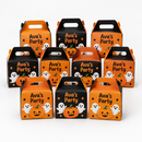Halloween treat boxes with the name Ava's Party on a white background