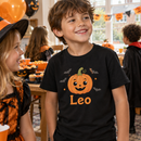 Personalised Halloween kids t-shirt with the name Leo worn at a Halloween party