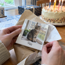 Personalised ceramic photo tile, being unwrapped at a birthday table with a cake in the background