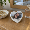 Personalised heart photo tile, on a dressing table next to a jewellery dish and perfume bottle