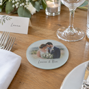 Personalised glass photo coaster, a set of glass coasters as wedding favours at each place on a wedding breakfast table