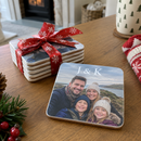 Personalised wooden photo coaster, a stack of coasters tied with ribbon as a Christmas stocking filler