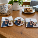 Personalised wooden photo coaster, square, round and rectangle versions side by side on a wooden table