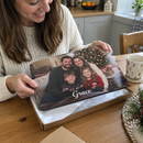 Personalised photo placemat, a boxed placemat being unwrapped at a kitchen table