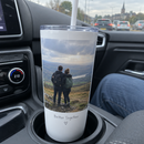 Photo tumbler with straw in a car cup holder