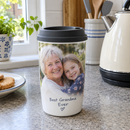 Photo ceramic travel mug on a kitchen worktop