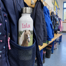 Name bottle with a pony photo in a school bag