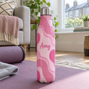 Pink pattern name bottle on a yoga mat