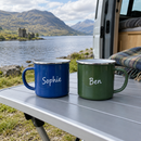 Pair of name enamel mugs in a campervan