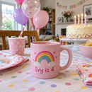 Pink age mug at a fourth birthday party