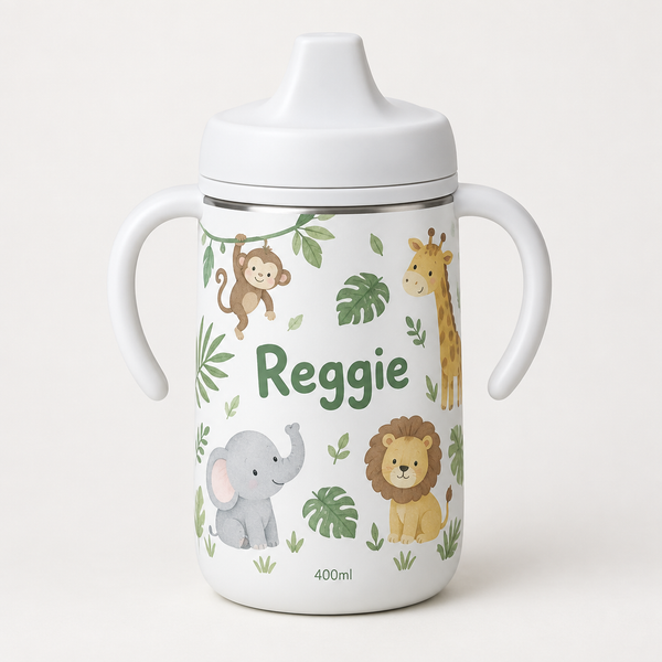 Personalised kids sippy cup with spout and two handles printed with jungle animals and the name Reggie