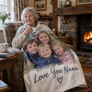 Nana wrapped in a photo blanket by the fire