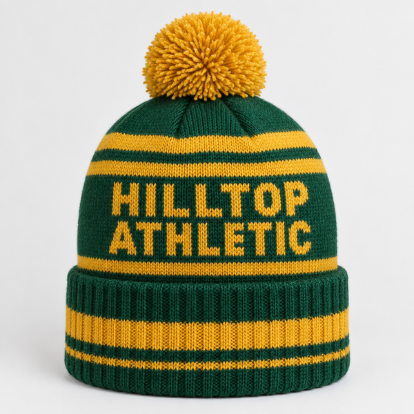 Custom knitted football bobble hat in green and gold with the team name knitted in
