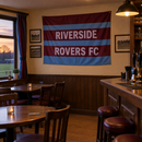 Custom team flag with name and badge hanging in a football clubhouse bar