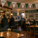 Football clubhouse bar decorated with personalised team bunting