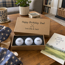 Personalised golf ball box opened as a birthday gift for Dad