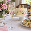 Pink rose Nana Joan 80 flute on an afternoon tea table
