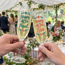 Pair of colour-printed 40th flutes in a garden marquee toast