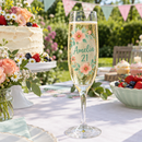 Flute with peach and mint flower print on a summer garden party table