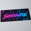 Personalised gamer tag gaming mat with a neon name on a dark background