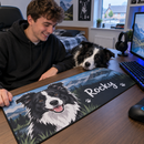 Gamer with a cartoon border collie mat and the real dog by the desk