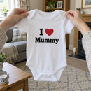 Lifestyle photo of the I heart Mummy baby grow in a UK home