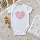 Lifestyle photo of the baby family name heart baby grow in a UK home